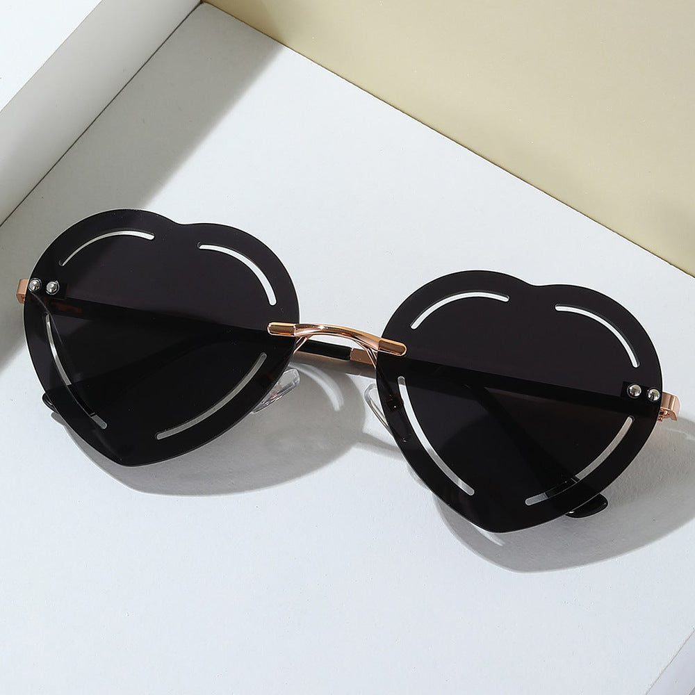 Damen Herzförmige Sonnenbrille mit stylischem Metallrahmen Brehn