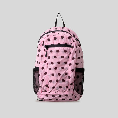 Verspielt gepunkteter Rucksack