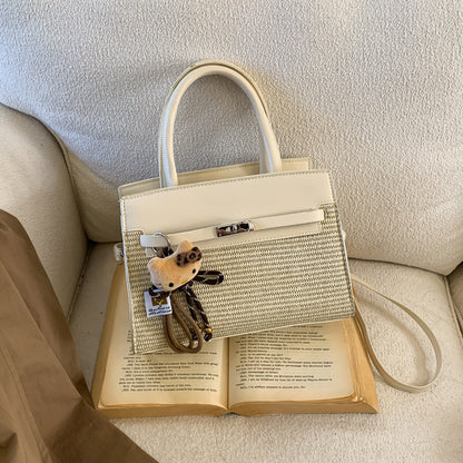 Elegante gewebte Handtasche mit abnehmbarem Schulterriemen