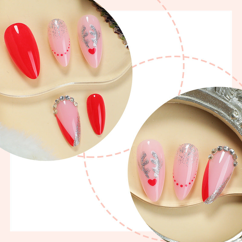 Künstlerisches Press-On Nagelset mit Herz- und Glitzerelementen Brehn