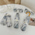 Damen Faltbarer Regenschirm mit romantischem Blumendesign Brehn