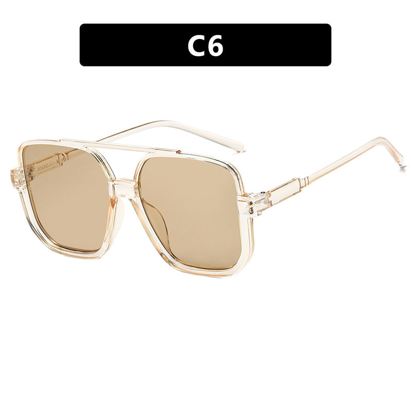 Damen quadratische Sonnenbrille mit transparentem Rahmen und grün getönten Gläsern Brehn