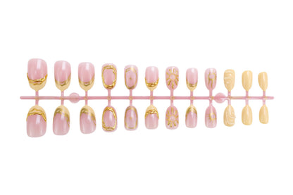 Kunstnagelset mit eleganten Goldverzierungen und kreativen Designs Brehn