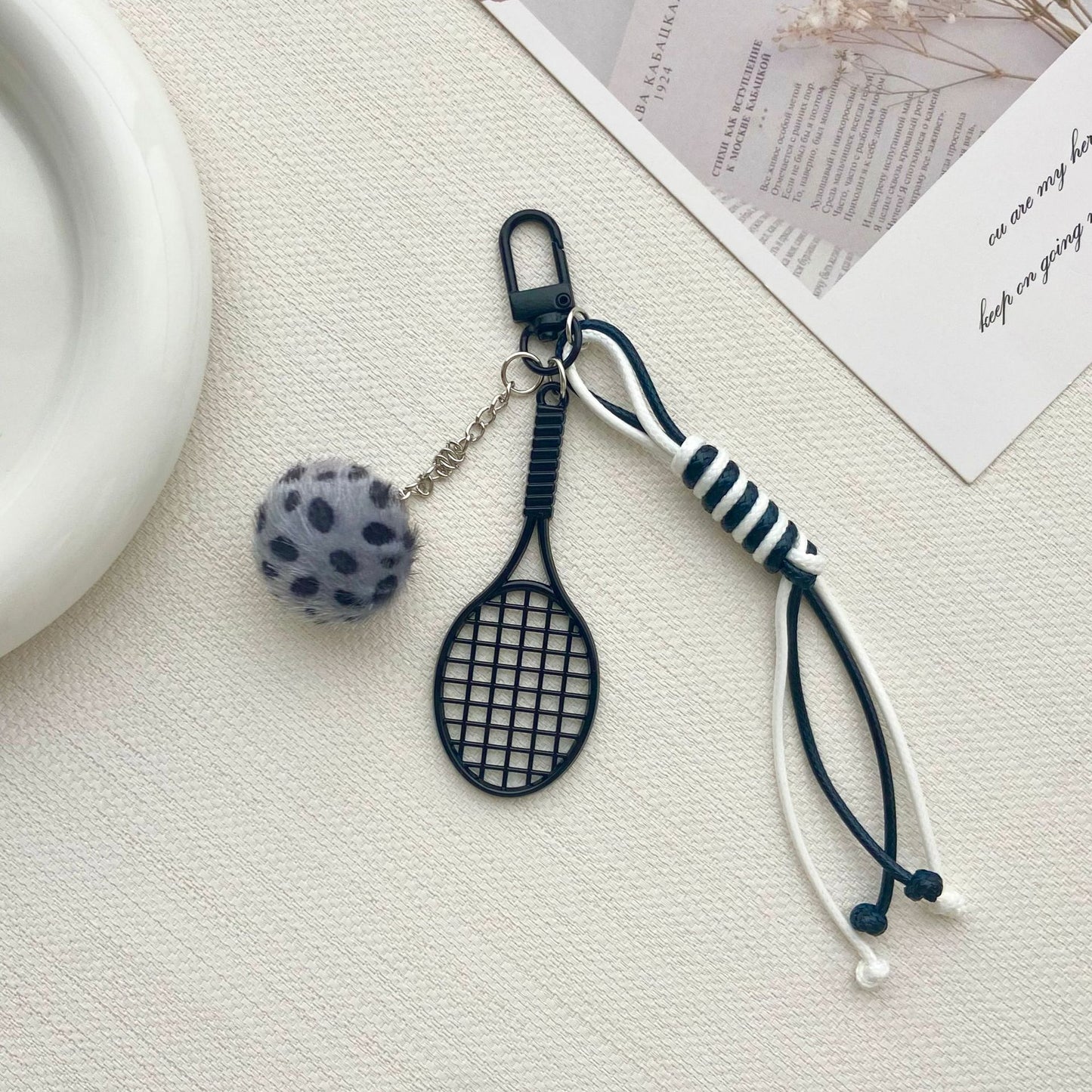 Tennisracket und Pelzball Schlüsselanhänger Brehn