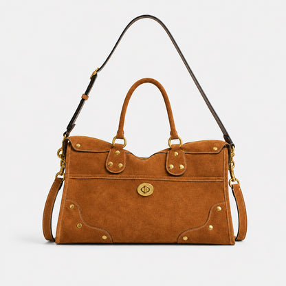 Elegante Wildlederhandtasche mit Messingakzenten