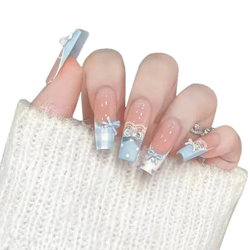 Dekoratives Press-On-Nagelset mit Schleifen- und Schmetterlingsdesigns Brehn
