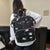 Verspielt bedruckter multifunktionaler Baby-Rucksack Brehn