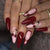 Kunstnagelset mit elegantem Rot- und Rosa-Design Brehn
