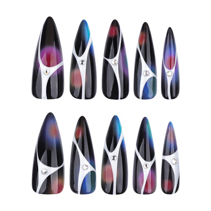 Kunstvolle Stiletto-Nägel mit glitzernden Akzenten und geometrischem Design Brehn
