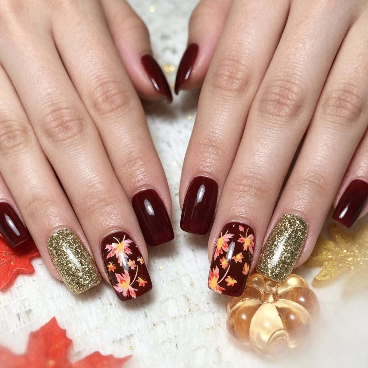 Künstlerische herbstliche Nagelkunst-Verzierungen Brehn