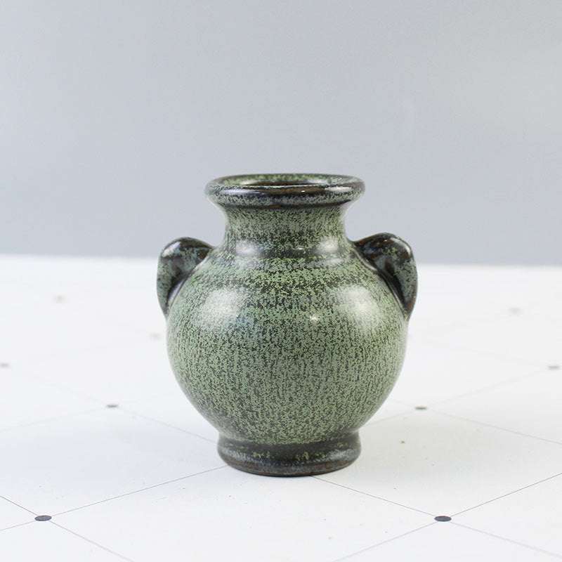 Elegante Keramikvase mit kunstvollem Design Brehn