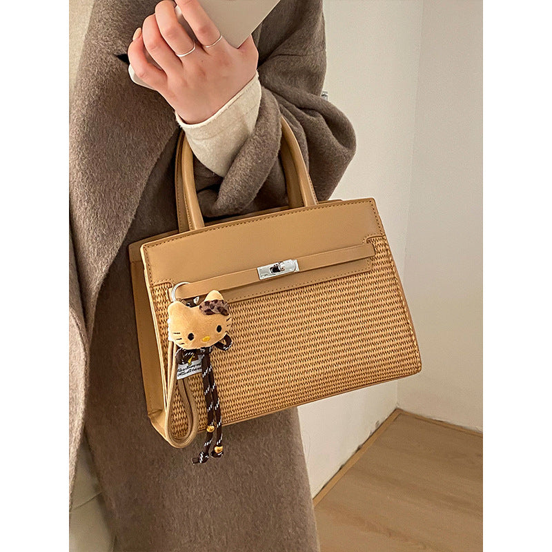 Elegante gewebte Handtasche mit abnehmbarem Schulterriemen
