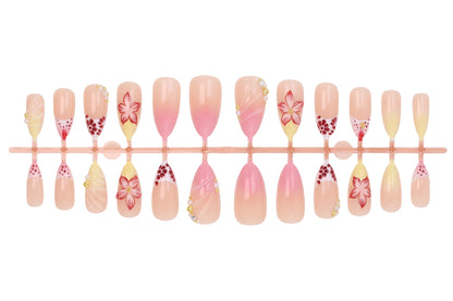 Kunstnagelset mit kreativen floralem Design und glitzernden Akzenten Brehn