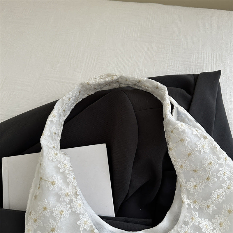Blumen bestickte Tragetasche