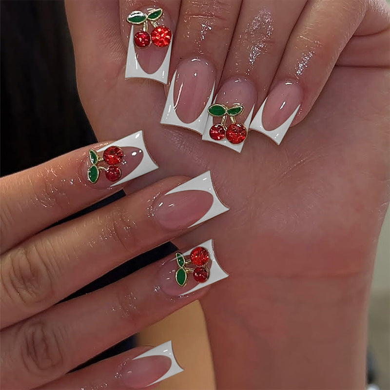 Kunstnagelset mit fröhlichen Kirschmotiven Brehn