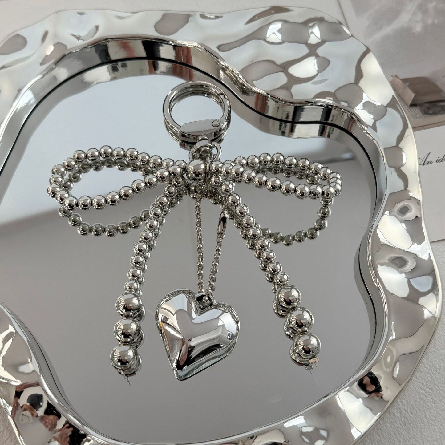 Eleganter Perlencharms-Schlüsselanhänger Brehn