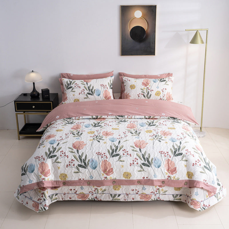 Umkehrbare gesteppte Blumendecke Set mit Knopfbesatz und passenden Kissenbezügen