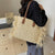 Stilvolle Basttasche mit Fransigen Details Brehn