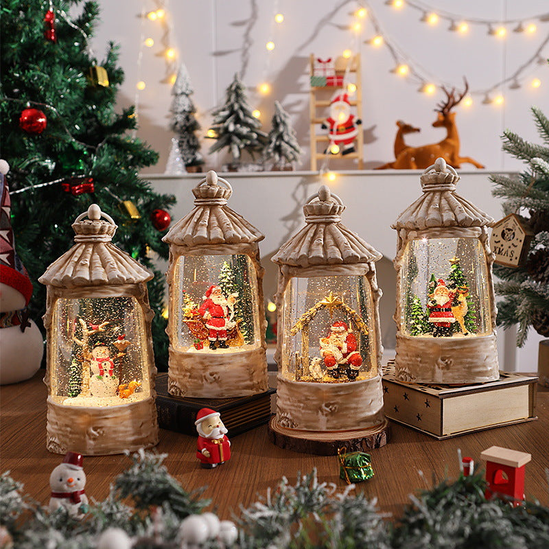 Beleuchtete Weihnachtslaterne mit Schneeszenen Brehn