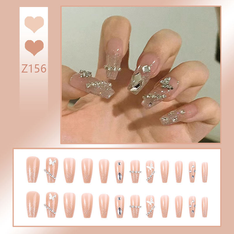 Glamouröse Kunstnägel mit funkelnden Strass und eleganten Designs Brehn