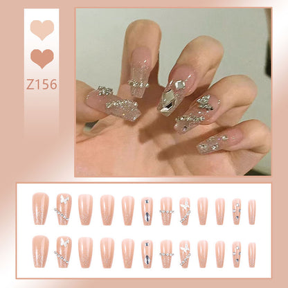 Glamouröse Kunstnägel mit funkelnden Strass und eleganten Designs Brehn