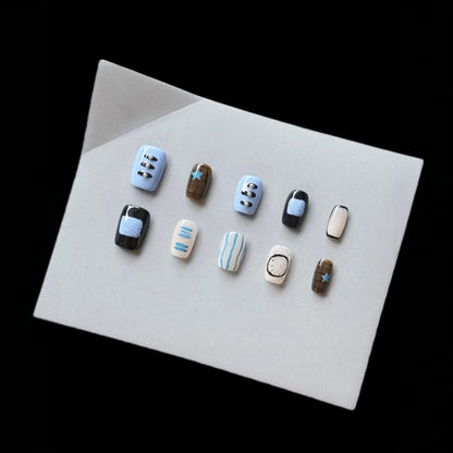 Künstlerisches Press-On Nagelkunst Set mit modernen geometrischen Mustern