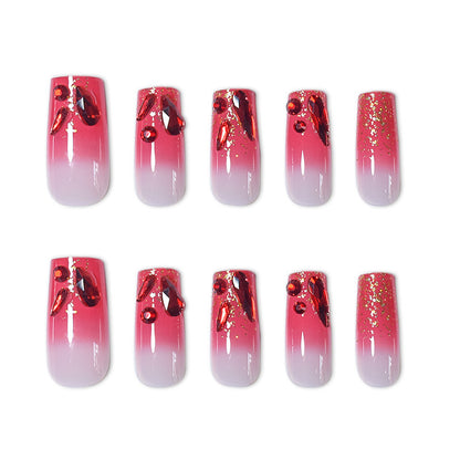 Dekoratives Acryl Press-On Nagelset mit Edelsteinakzenten Brehn