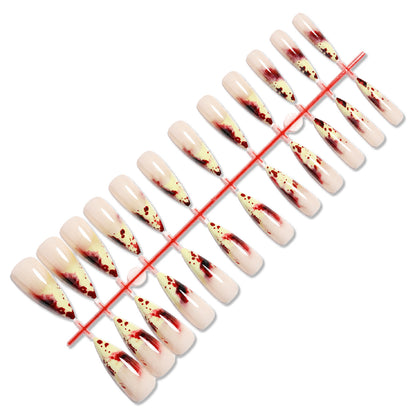 Kunstnagelset mit blutigen Akzenten und elegantem Stiletto-Design Brehn
