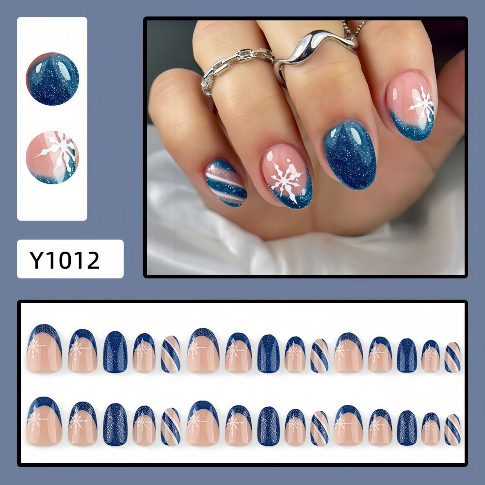 Kunstnägel mit Glitzerndem Blau und Floralem Design Brehn