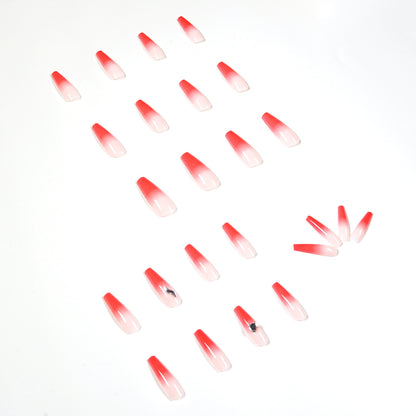 Kunstvolle Stiletto-Nägel mit elegantem Farbverlauf und Strassverzierung Brehn