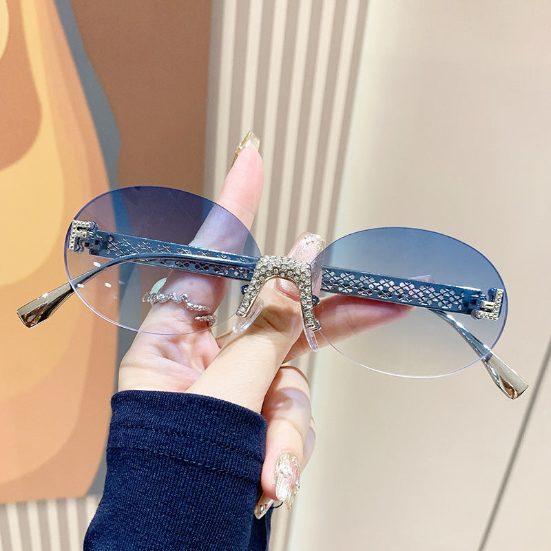 Damen Sonnenbrille mit glitzerndem Rahmen und ovalen Gläsern Brehn