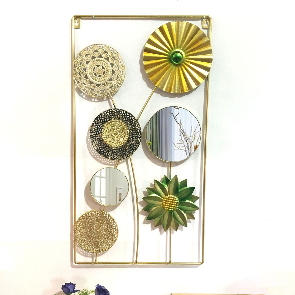 Dekorative Metallwandkunst mit tropischem Blatt- und Spiegeldesign Brehn
