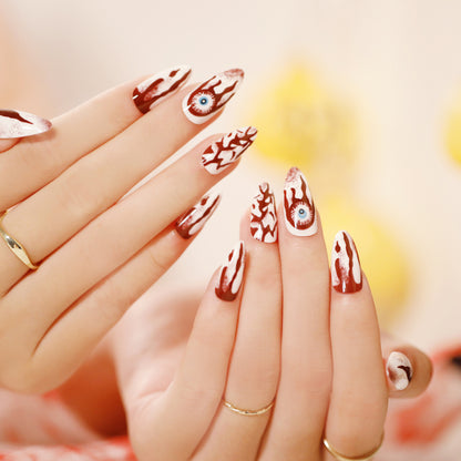 Kunstvolle Nagelverlängerungen mit kreativen Augen-Design Brehn