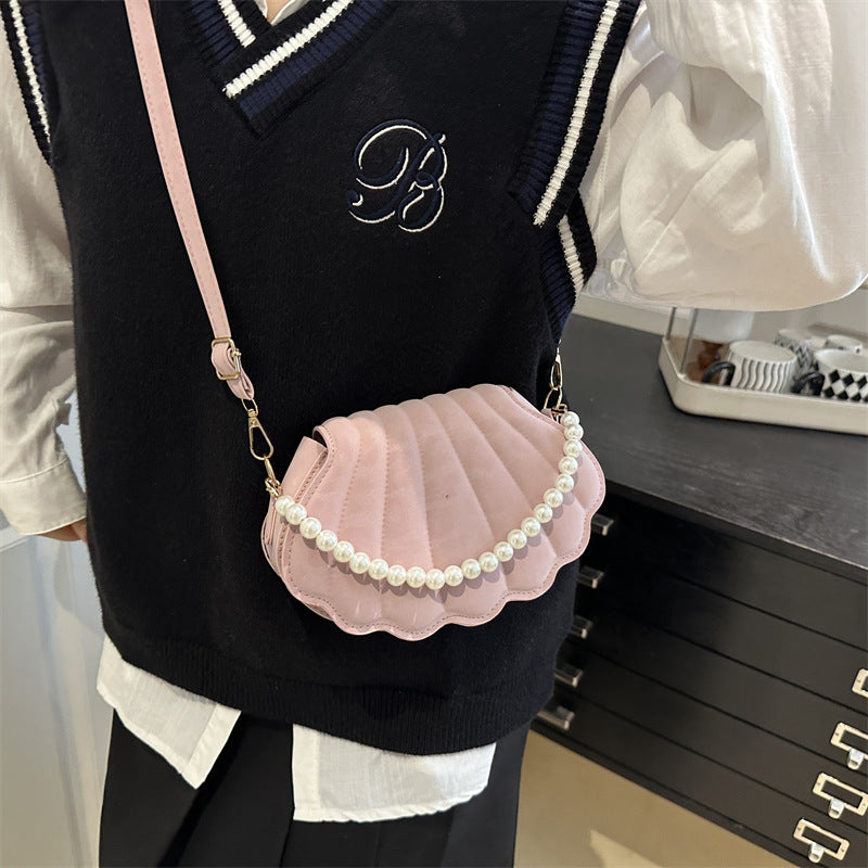 Elegante muschelförmige Umhängetasche Brehn