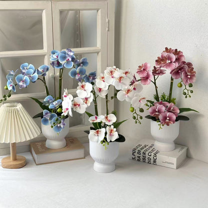 Lebensnahe Orchideenpflanzenarrangement für Tischdekoration