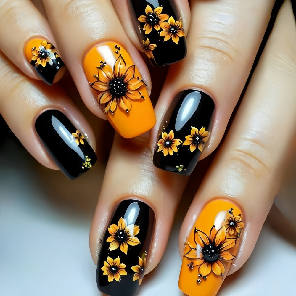 Kunstnägel im floralen Design mit Sonnenblumenmotiv Brehn