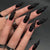 Künstlerisches Stiletto-Nageldesign Brehn