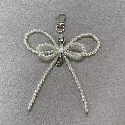 Elegante Perlenbogen Schlüsselanhänger Brehn