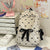 Charmanter Rucksack mit Schleifenakzent