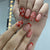 Kreatives Kunstnagelset mit Herzen und Spitzen Design Brehn
