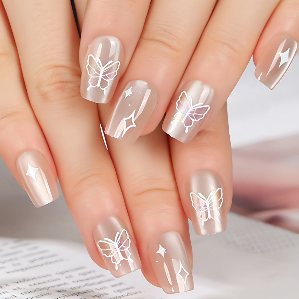 Kunstnägel mit floralem und glitzerndem Design Brehn