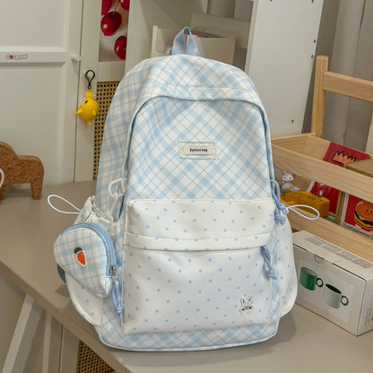 Stylische Karomuster-Rucksack mit lustigen dekorativen Akzenten Brehn