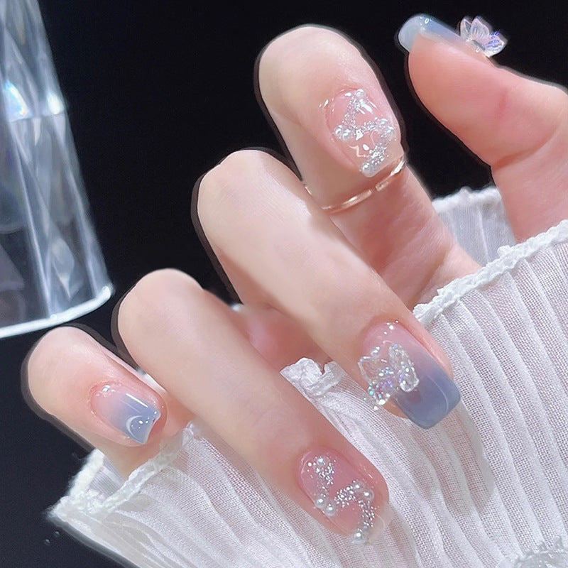 Thematische Nagelkunst Press-On Nägel mit süßen Charakter- und Schleifendesigns Brehn