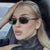 Damen Sonnenbrille mit elegantem Metallrahmen und stilvollen Holzdetails Brehn