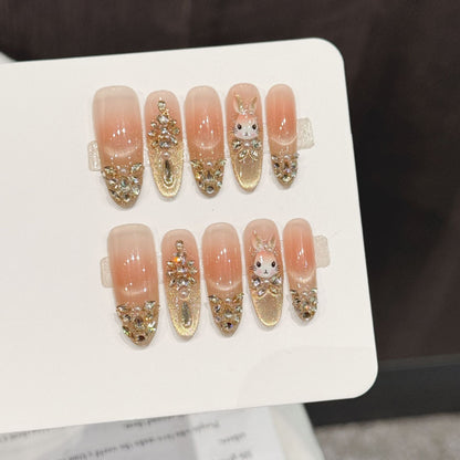 Dekoratives Press-On Nagelkunstset mit Hasen- und Edelsteinakzenten