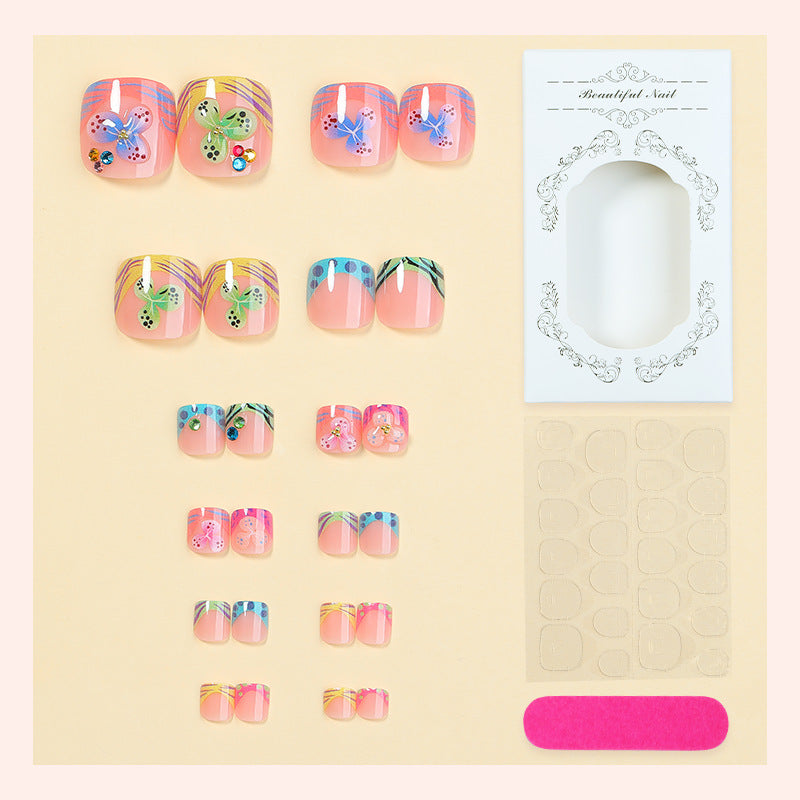 Dekoratives Press-On Nagelset mit eleganten Schmetterlingsdesigns Brehn