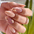 Kunstnagelset mit eleganten Blütenmotiven Brehn