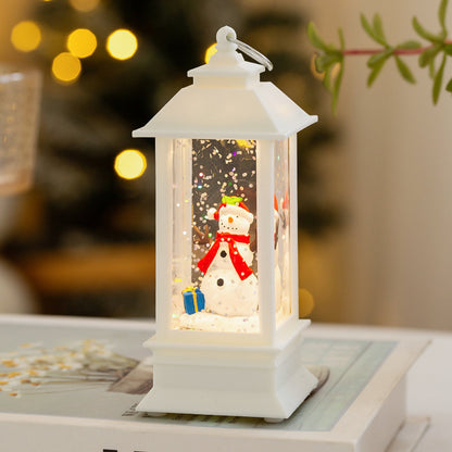 Weihnachtslaterne mit LED-Beleuchtung und dekorativem Schneeeffekt