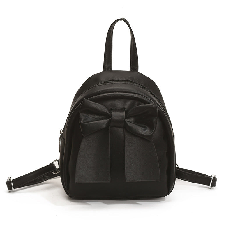 Bogenakzentierter Faux-Leder Mini-Rucksack