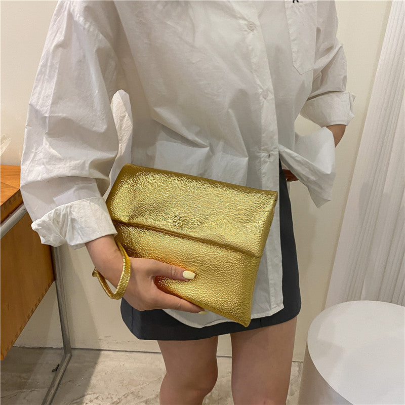 Elegante Texturierte Handgelenk-Clutch Brehn